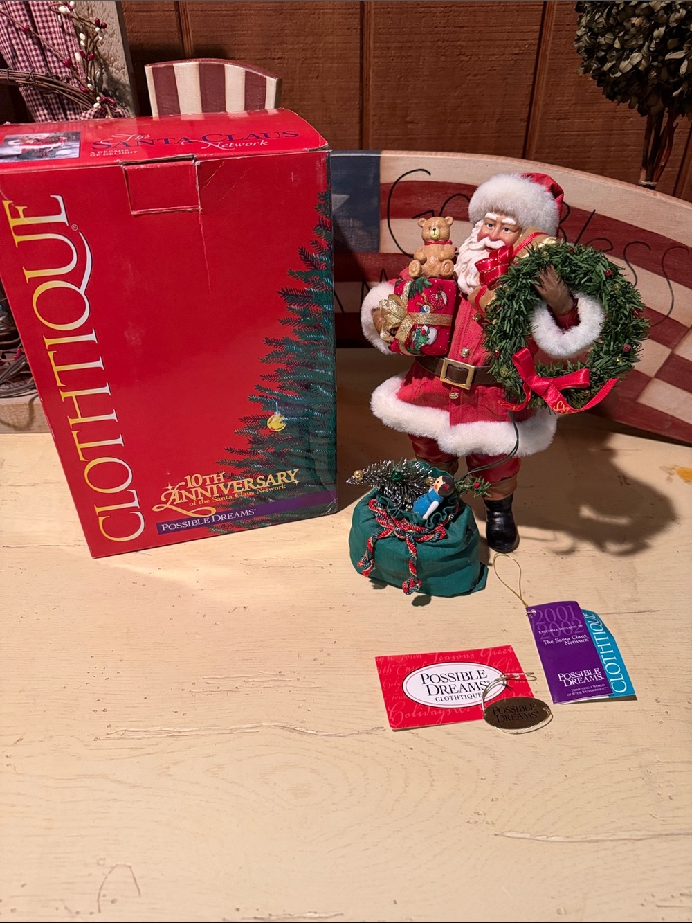Clothtique Red Santa Figurine with Wreath and Toy Sack